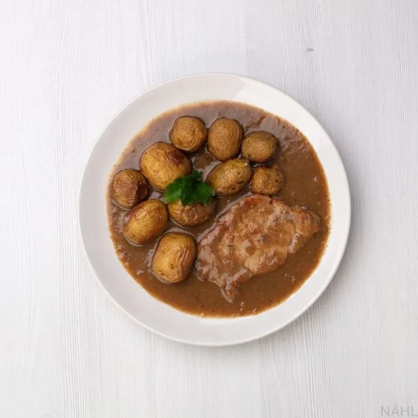 Vepřová kotleta na houbách, brambory ve slupce